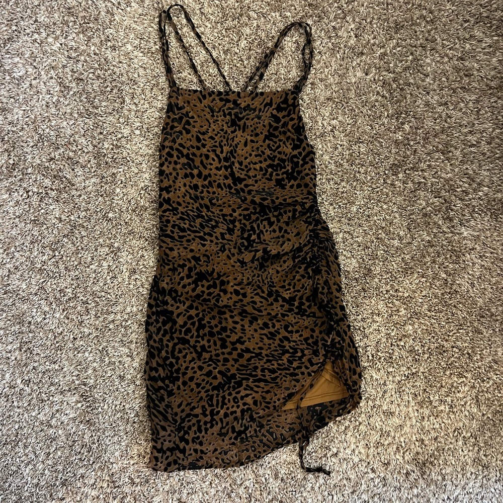 Animal print mini dress, size L, adjustable sinch length, great condition